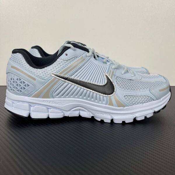 Nike Zoom Vomero 5 light blue / white / black with metallic silver accents running
