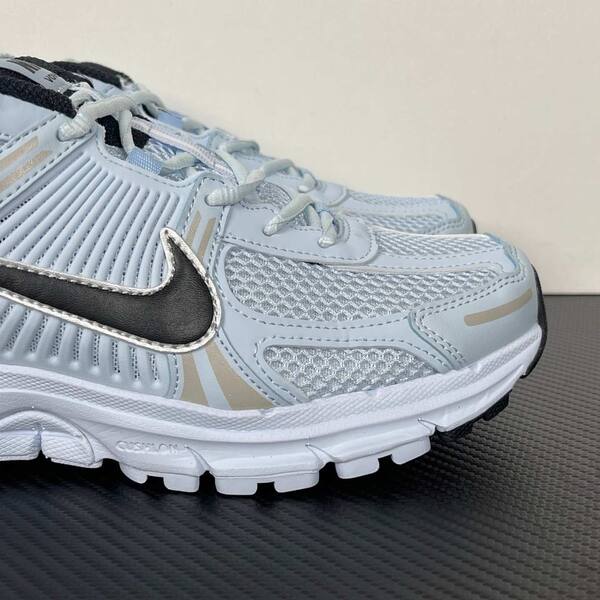 Nike Zoom Vomero 5 light blue / white / black with metallic silver accents running