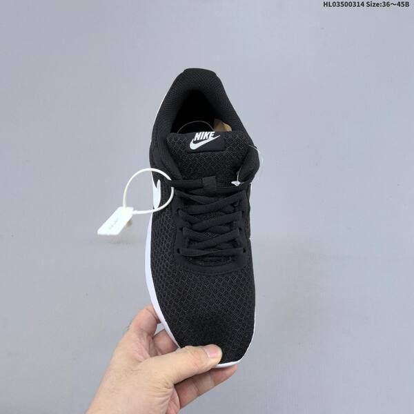 Nike Tanjun black white EU 36-45 running shoe