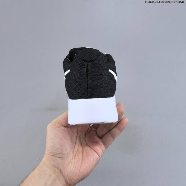 Nike Tanjun black white EU 36-45 running shoe