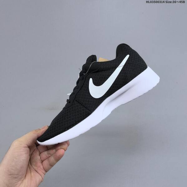 Nike Tanjun black white EU 36-45 running shoe