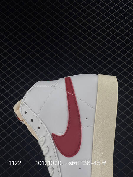 Nike WMNS Blazer Mid 77 Vintage SE white black cream with orange accents 36-45 lifestyle
