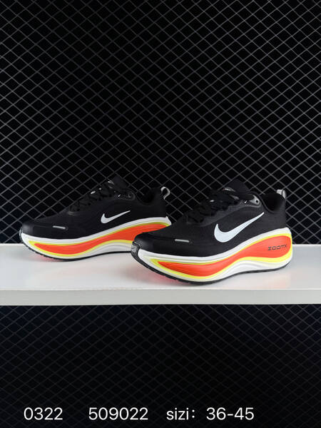 Nike Vomero Plus black white with orange-yellow accents 36-45 running lifestyle