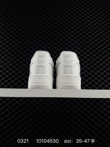 Nike Air Force 1 07 CW2288-111 White with blue yellow graphic accents EU 35-47 5 lifestyle