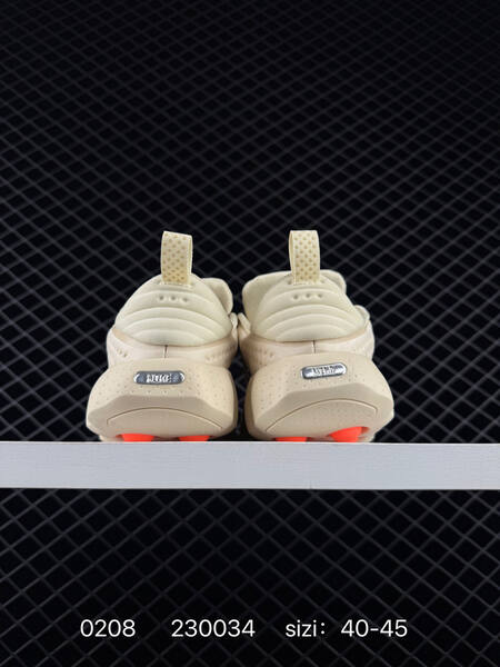 Nike Mind 002 beige cream with black swoosh and orange outsole accents 40-45 training lifestyle