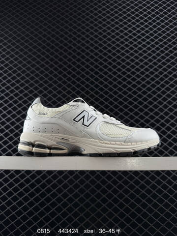 New Balance 2002R dark gray beige gray