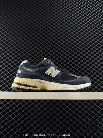 New Balance 2002R dark gray beige gray