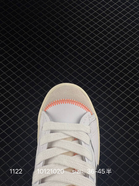 Nike WMNS Blazer Mid 77 Vintage SE white black cream with orange accents 36-45 lifestyle
